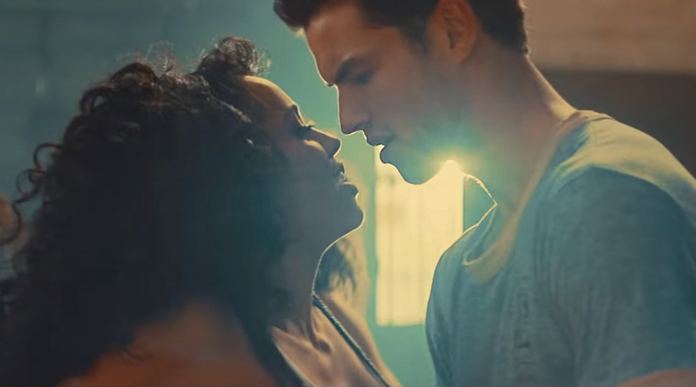 Кадр из клипа «Higher Love»