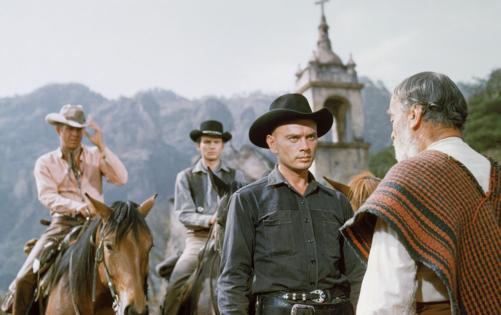 Кадр из фильма «Великолепная семерка» (1960). Стив МакКуин поправляет шляпу