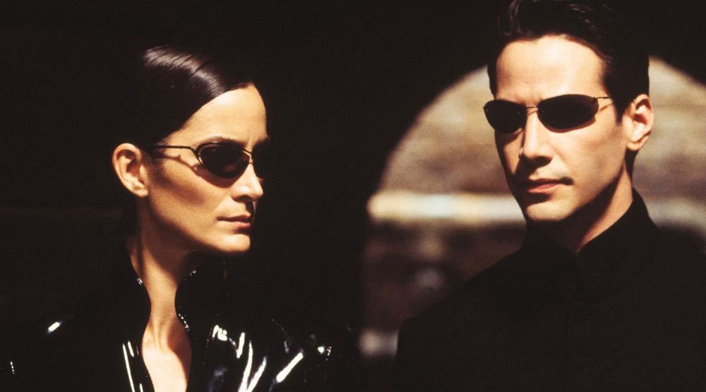 Керри-Энн Мосс в образе Тринити и Киану Ривза в образе Нео