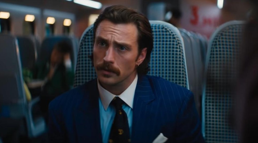 Аарон Тейлор-Джонсон, кадр из фильма «Быстрее пули» (2022)