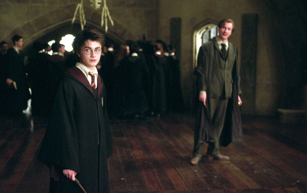 Гарри Поттер и Римус Люпин на уроке защиты от темных искусств, кадр из фильма «Гарри Поттер и Узник Азкабана» (2004)